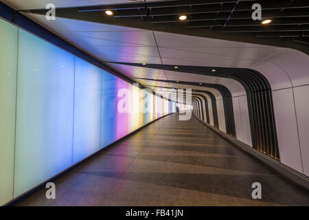 A pedestrian tunnel features an LED integrated lightwall and links St Pancras International and King's Cross St Pancras stations Stock Photo