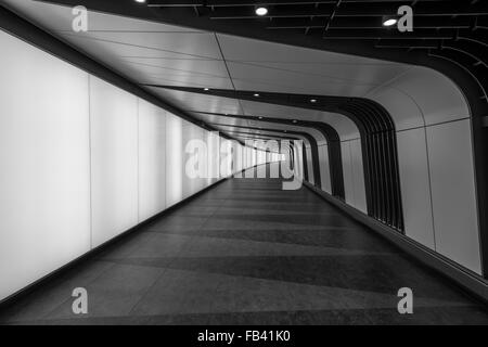 A pedestrian tunnel features an LED integrated lightwall and links St Pancras International and King's Cross St Pancras stations Stock Photo