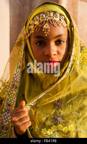 Young girl in traditional costume, Oman Stock Photo