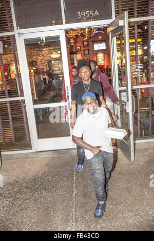 Tyrin Turner & Son, Singer / Rapper 'Lil Caine The Artist' Seen Leaving Dinner with Social Media Star A Town & Friends    Tyrin Turner & Lil Caine both are Starring in Snoop Dogg's Musical Film 'G7'    The group is seen leaving Dinner at BJ's in Thousand Stock Photo