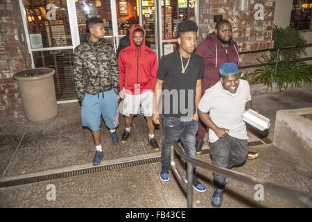 Tyrin Turner & Son, Singer / Rapper 'Lil Caine The Artist' Seen Leaving Dinner with Social Media Star A Town & Friends    Tyrin Turner & Lil Caine both are Starring in Snoop Dogg's Musical Film 'G7'    The group is seen leaving Dinner at BJ's in Thousand Stock Photo