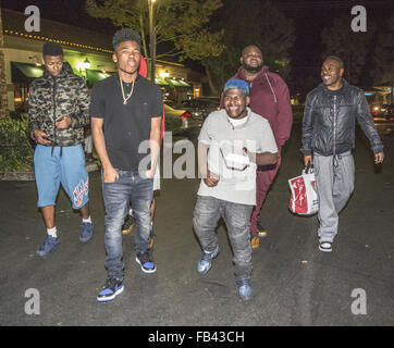 Tyrin Turner and rapper Lil Caine The Artist leaving BJ’s with friends in Thousand Oaks  Featuring: Tyrin Turner, Lil Caine The Artist Where: Thousand Oaks, California, United States When: 08 Dec 2015 Stock Photo