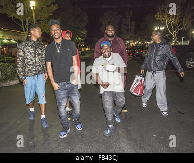 Tyrin Turner and rapper Lil Caine The Artist leaving BJ’s with friends in Thousand Oaks  Featuring: Tyrin Turner, Lil Caine The Artist Where: Thousand Oaks, California, United States When: 08 Dec 2015 Stock Photo