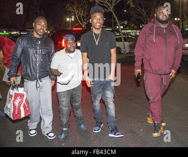 Tyrin Turner and rapper Lil Caine The Artist leaving BJ’s with friends in Thousand Oaks  Featuring: Tyrin Turner, Lil Caine The Artist Where: Thousand Oaks, California, United States When: 08 Dec 2015 Stock Photo