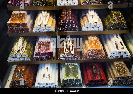 Shelves full of coloured turkish delight in a shop window in Istanbul Stock Photo