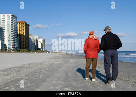 Caucasian couple walking Myrtle Beach SC USA Stock Photo
