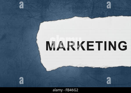 marketing with white paper tears on blue texture Stock Photo