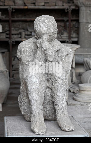 Plaster cast of human remains found in excavation of Pompeii Stock Photo