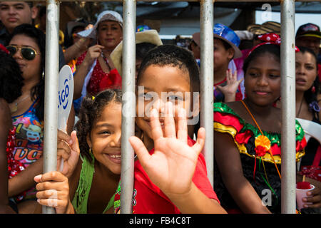 Barranquilla, Colombia - March 1, 2014: People attending the carnival parades at the Carnival of Barranquilla, in Colombia. Stock Photo