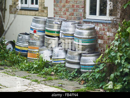 Bear Barrels or Kegs stacked against a wall Stock Photo