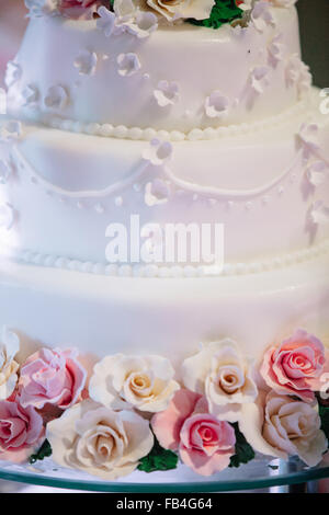 wedding cake decorated with roses Stock Photo
