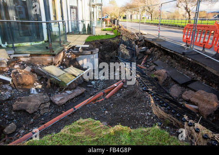 On Saturday 5th December 2015, Storm desmond crashed into the UK, producing the UK's highest ever 24 hour rainfall total at 341.4mm. It flooded many towns including Cockermouth. This shots shows flood damage when the River Derwent broke its banks, to house gardens on Gote road in Cockermouth. Stock Photo