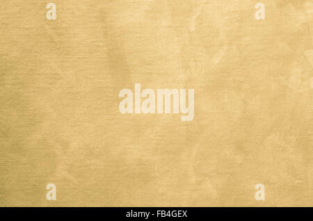 golden painted artistic canvas  background texture with pearly shimmer Stock Photo