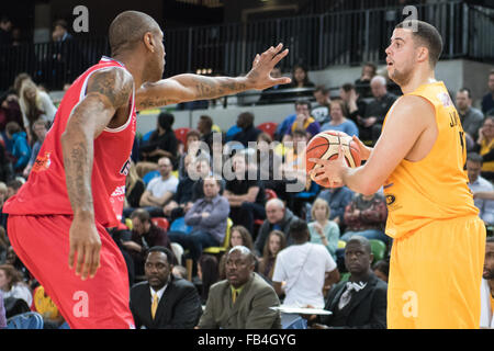 London, UK. 8th January, 2016. London Lions beaten 50 vs 71 to Leicester Riders. London Lions Jamal Williams (14) looks for a way around Leicester Riders Drew Sullivan (8). Credit:  pmgimaging/Alamy Live News Stock Photo