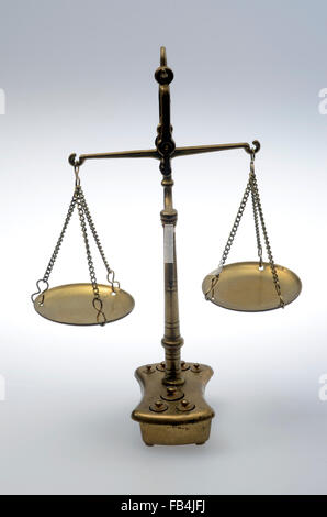 Old Golden weighing scale balance Stock Photo