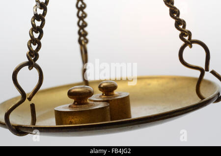 Old Golden weighing scale balance Stock Photo