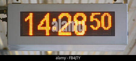 Close up of a modern railway station digital clock Essex England UK Stock Photo