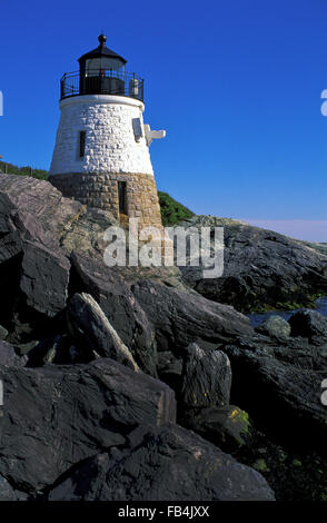 Castle Hill lighthouse was constructed on a rocky shoreline stone cliff near Newport, Rhode island. Stock Photo