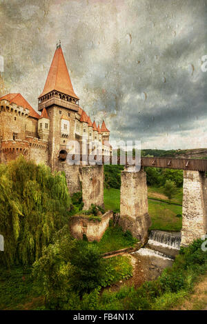 Romanian Hunedoara famous castle, in a rain textured view Stock Photo