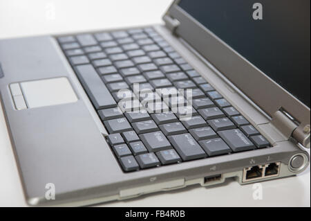 Laptop computer with focus on shift key. Stock Photo
