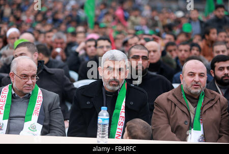 Palestine. 09th Jan, 2016. Hamas leader Yahya Sinwar (center) with his son during the festival Hamas in Khan Younis in the southern Gaza Strip. The march organized by Hamas, held to honor the families of Hamas dead fighters, and released in exchange for more than 1,000 Palestinians held in Israeli prisons. © Ramadan El-Agha/Pacific Press/Alamy Live News Stock Photo