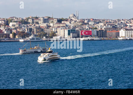 Istanbul. Turkey-September 19th 2015: Ferries cross each other on the Bosphorous in Istanbul. Stock Photo