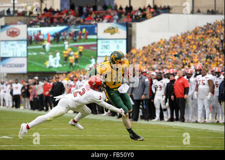 Frisco, Texas, USA. 9th Jan, 2016. North Dakota State Bison quarterback Carson Wentz (11) escapes Jacksonville State Gamecocks cornerback Jermaine Hough (2) and runs for a touchdown during the first half of the 2016 NCAA Division 1 Football Championship game between the Jacksonville State Gamecocks and the North Dakota State Bison at Toyota Stadium, in Frisco, Texas. Shane Roper/CSM/Alamy Live News Stock Photo