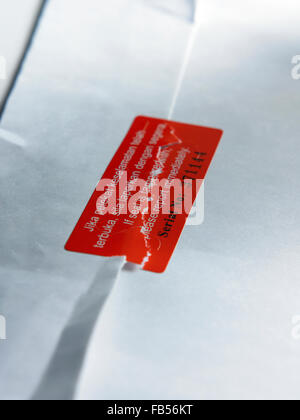 protection seal on envelope is broken Stock Photo