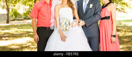 The bride and groom with guests Stock Photo