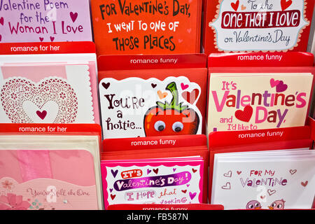 Closeup of romantic and funny valentine's greeting cards in the store.  Valentine cards in the shop. Stock Photo