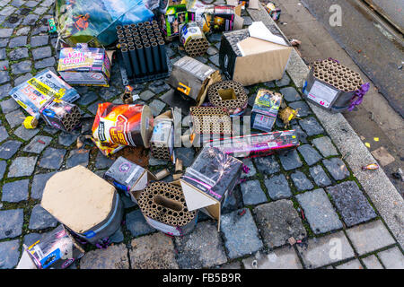 Leftovers from New Years fireworks in the streets of Essen, Germany, on New Years day, waste of firecrackers, Stock Photo
