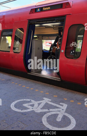 Bicycle sign on platform by S Train with cycle carriage door open in Vesterport railway station. Copenhagen Denmark Scandinavia Stock Photo