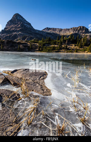 Colbricon frozen lake near Passo Rolle. Winter season. Trentino. Italian Alps. Europe Stock Photo