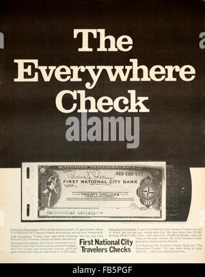 1960s magazine advertisement advertising First National City Bank Travellers Cheques or Travelers Checks. Stock Photo