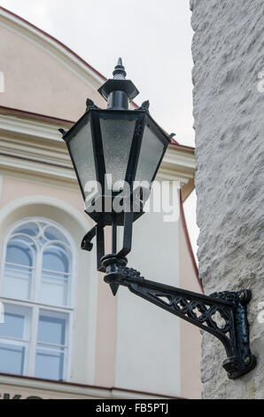 Beautiful lantern on a wall of the house in Old Tallinn Stock Photo