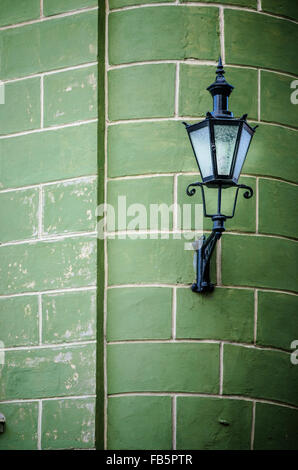 Beautiful lantern on a wall of the house in Old Tallinn Stock Photo