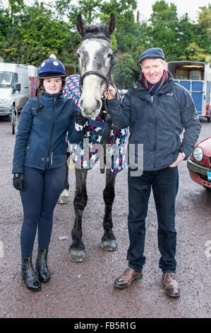 Drimoleague, Ireland. 10th January, 2016. Emily Crowley and dad Donal Crowley are pictured with their horse 'Buddy' after the Drimoleague to Drinagh Cheval. The Cheval was held to raise funds for COPE Foundation. Credit: Andy Gibson/Alamy Live News Stock Photo