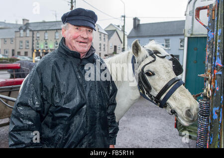 Drimoleague, Ireland. 10th January, 2016. John O'Mahony from Church Cross is pictured with his horse, Misty after the Drimoleague to Drinagh Cheval. The Cheval was held to raise funds for COPE Foundation. Credit: Andy Gibson/Alamy Live News Stock Photo