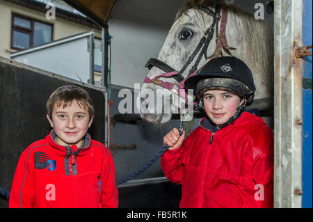 Drimoleague, Ireland. 10th January, 2016. Liam and Sean Twomey are pictured with ther horse 'Tom' safely tucked away in his horse box after the Drimoleague to Drinagh Cheval. The Cheval was held to raise funds for COPE Foundation. Credit: Andy Gibson/Alamy Live News Stock Photo