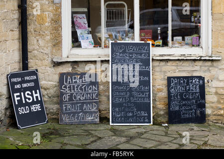 Blackboard outside a Butchers advertising Local foods and game Stock Photo
