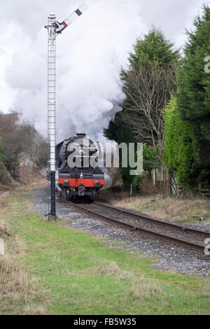 Bury, Lancashire, UK. 10th January, 2016. Flying scotsman completes first weekend of passenger service on the east lancashire railway. Delays were caused on saturday with the engine running upto an hour late due to issues another steam locomotive on the line. Crowds came out at all stations to see the famour loco. Credit:  Light-Phase Photography/Alamy Live News Stock Photo