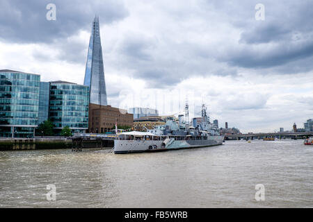 HMS Belfast, moored on the Thames, London, UK Stock Photo