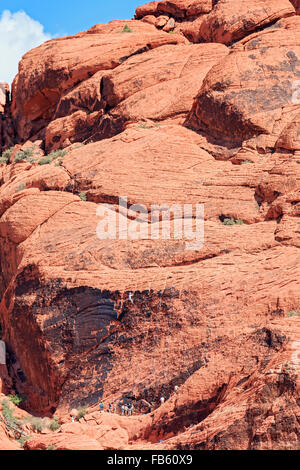 Climbers scale the red rock of Calico 1 area in the Calico Hills of Red Rock Canyon National Conservation Area Stock Photo