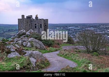 Carn Brea castle overlooking the town of Redruth in Cornwall, UK Stock Photo