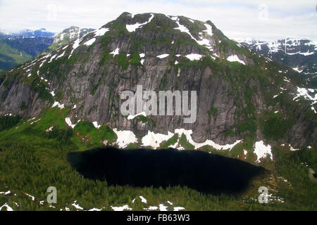 Aerial scenery during a sightseeing flight of mountains in the beautiful Misty Fjords near Ketchikan, Alaska Stock Photo