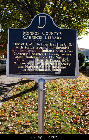 MONROE COUNTY'S CARNEGIE LIBRARY  One of 1, 679 libraries built in U.S. with funds from philanthropist Andrew Carnegie. Indiana built more Carnegie libraries than any other state. Building listed in National Register of Historic Places 1978. Monroe County Historical Society and Museum refurbished and occupied building 1980.  (Continued from other side)  Installed 2007 Indiana Historical Bureau and Monroe County Public Library Foundation Stock Photo