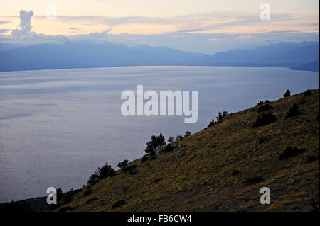Photo of the Macedonia's Lake Ohrid, one of Europe's deepest and oldest lakes, at sunset Stock Photo