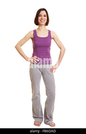 Full body shot of young smiling woman in sportswear Stock Photo