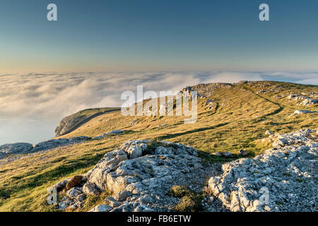 Great Ormes head or Pen y Gogarth Llandudno North Wales looking out over clouds during a temperature inversion November 2015 Stock Photo