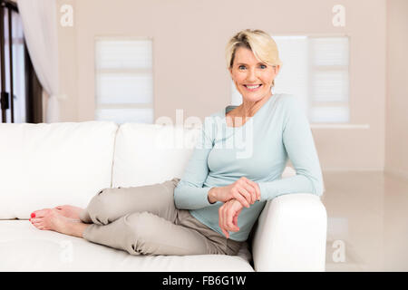 beautiful senior woman sitting at home Stock Photo